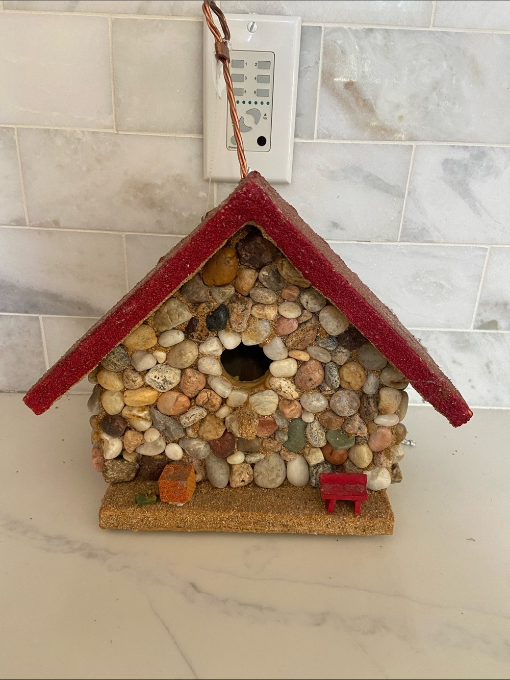Stone Pebble Birdhouse with Red Roof